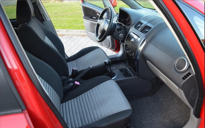 Suzuki SX4 cena 31900 przebieg: 93865, rok produkcji 2013 z Piastów małe 562